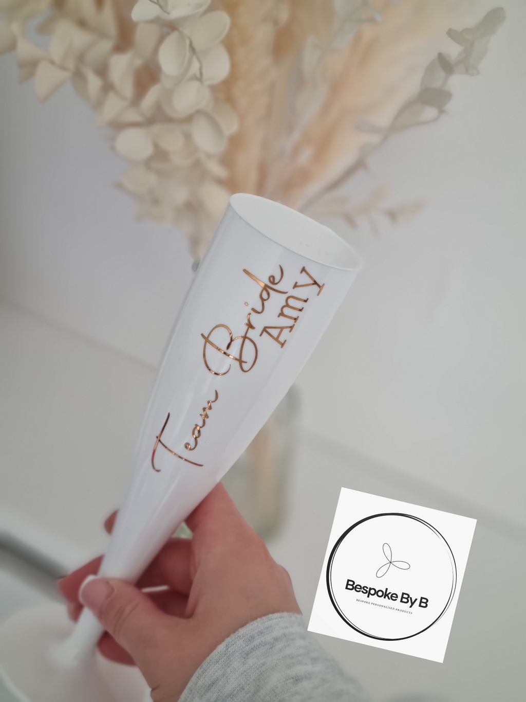 White plastic champagne flutes